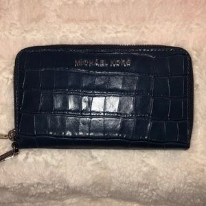Michael Kors navy croc embossed leather wallet.